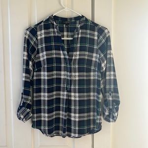 The Limited partial button down blouse with button sleeves in classic print.